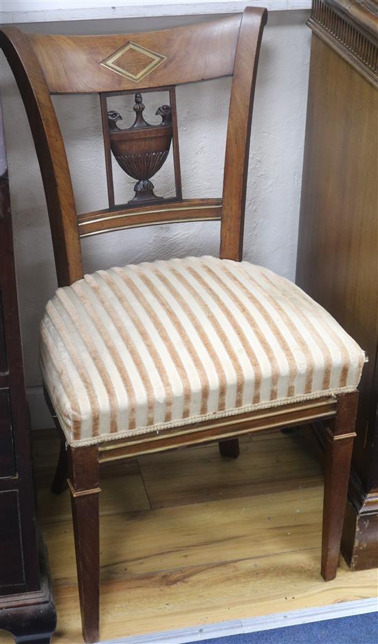 A pair of French Empire brass inset mahogany salon chairs